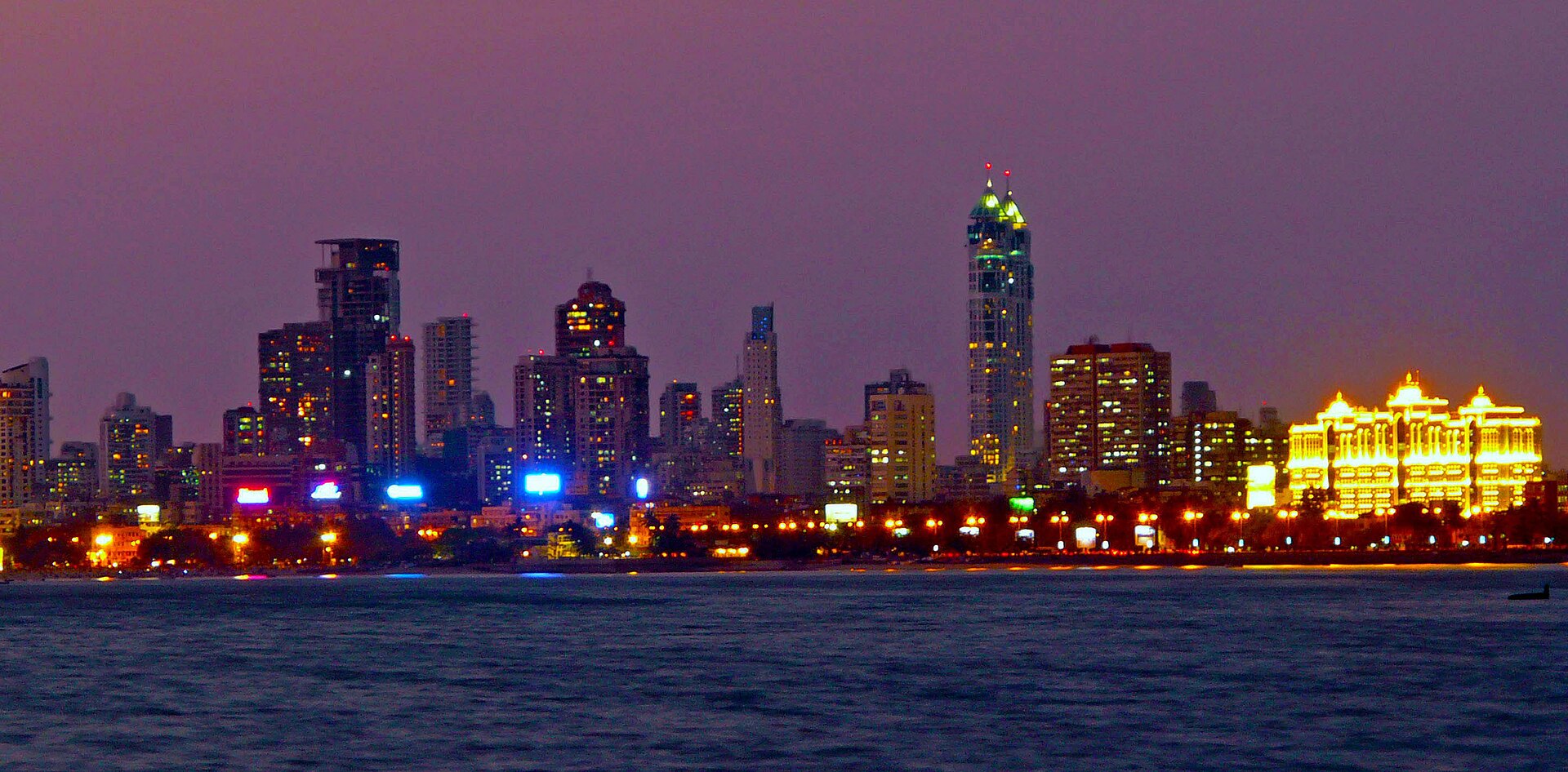 Mumbai skyline lit up at night along Marine Drive